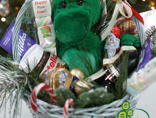 New Year basket with candies and Dragon Louis photo